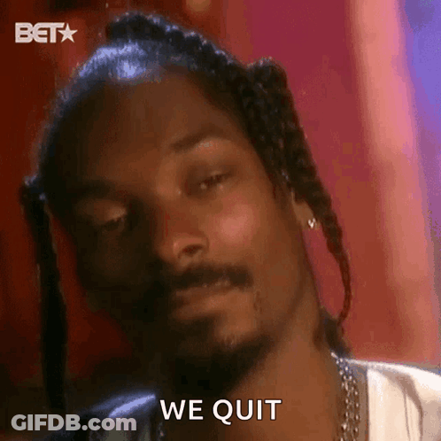 A Close Up Of Snoop Dogg 'S Face With The Words We Quit Written On The Bottom GIF