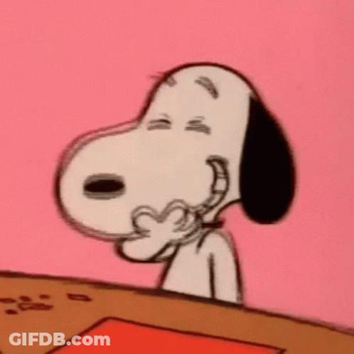 A Close Up Of Snoopy Making A Heart With His Hand GIF