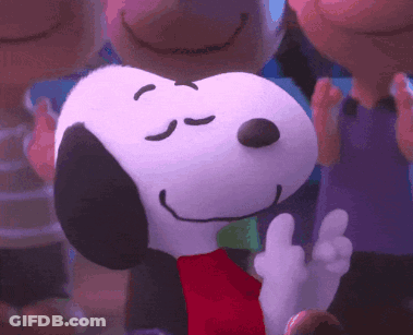A Close Up Of Snoopy With His Eyes Closed And A Red Scarf Around His Neck GIF
