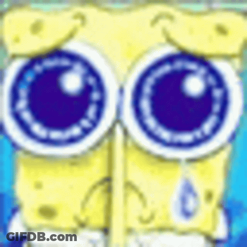 A Close Up Of Spongebob Squarepants ' Face With Big Blue Eyes And A Tear Coming Out Of His Eye . GIF