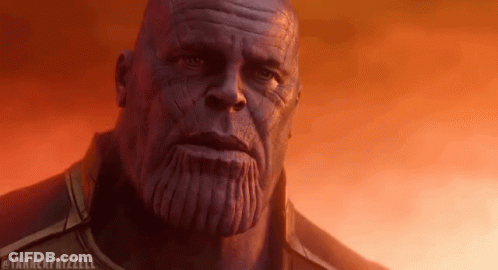 A Close Up Of Thanos ' Face With A Tanner Frizzell Watermark GIF