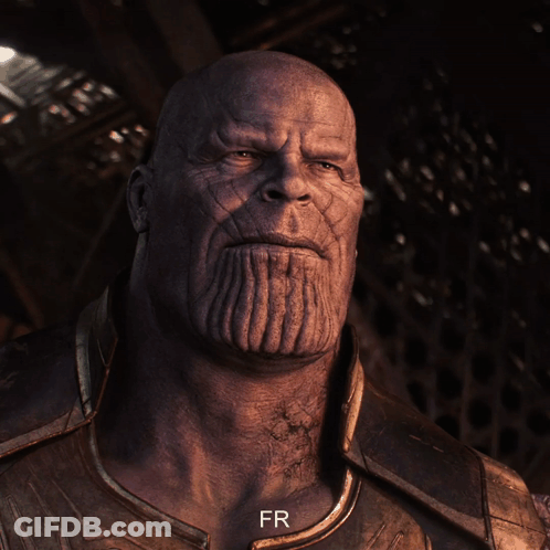 A Close Up Of Thanos ' Face With The Letters Fr Below Him GIF