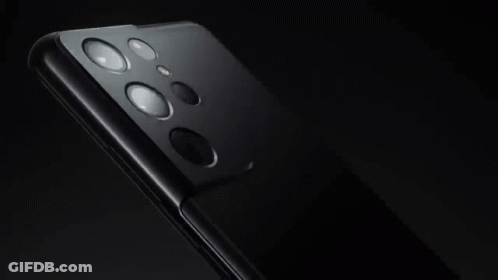 A Close Up Of The Back Of A Cell Phone Showing The Camera Lenses GIF