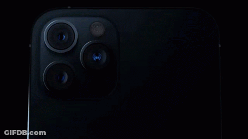 A Close Up Of The Back Of An Iphone With Three Cameras On It . GIF