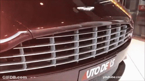 A Close Up Of The Front Of A Car With A License Plate That Says Uto Deus GIF