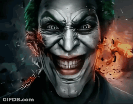 A Close Up Of The Joker 'S Face With A Huge Smile GIF