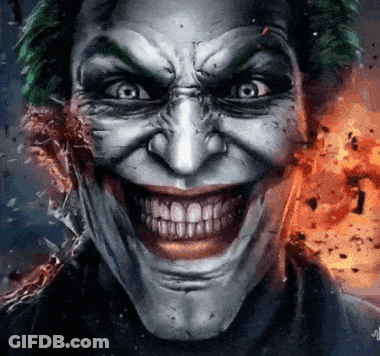 A Close Up Of The Joker 'S Face With A Large Smile GIF