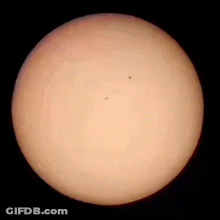 A Close Up Of The Sun Taken Through A Telescope On A Black Background . GIF