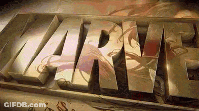 Close Up Of Marvel Text On Table GIF