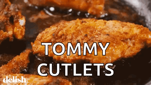 A Close Up Of Tommy Cutlets In A Pan GIF