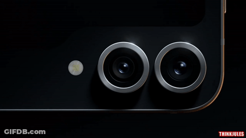 A Close Up Of Two Camera Lenses On A Black Phone With Thinkjules Written Below It GIF
