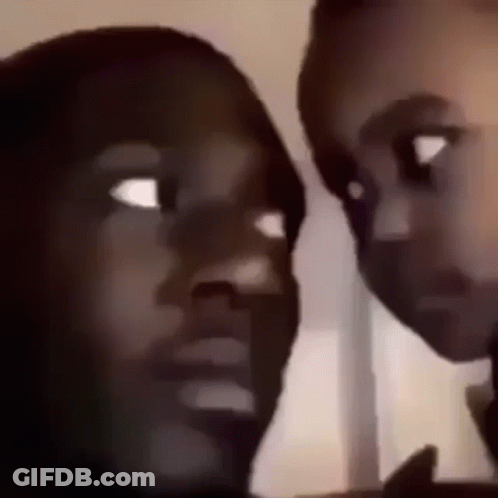 A Close Up Of Two People 'S Faces With Their Eyes Closed . GIF