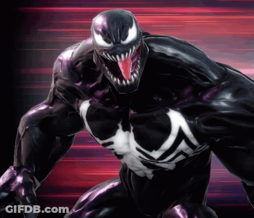 A Close Up Of Venom With His Mouth Open And Tongue Hanging Out GIF