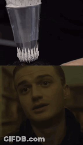 A Close Up Of Whipped Cream And A Close Up Of A Man GIF