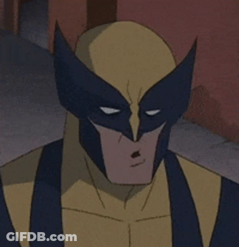 A Close Up Of Wolverine 'S Face With A Serious Look On His Face GIF