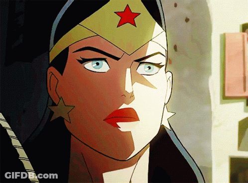 A Close Up Of Wonder Woman 'S Face With A Red Star On Her Hat GIF