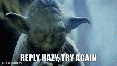 A Close Up Of Yoda 'S Face With The Words Reply Hazy Try Again GIF