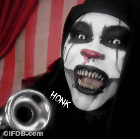 A Clown Is Holding A Trumpet With Honk Written On The Sleeve GIF