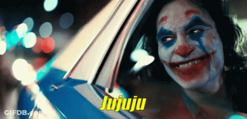 A Clown Is Smiling In A Car With The Word Jujuju On The Bottom Right GIF
