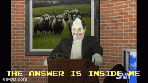 A Clown Stands At A Podium With A Picture Of Sheep Behind Him And The Words The Answer Is Inside Me GIF