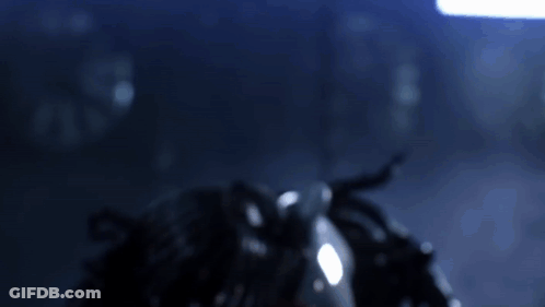 A Clown With A Button On His Chest That Says ' 8 ' GIF