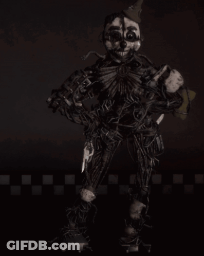 A Clown With A Skull On His Face Is Holding A Knife In His Hand GIF