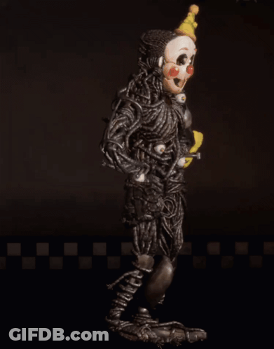 A Clown With A Yellow Hat Is Holding A Yellow Item GIF