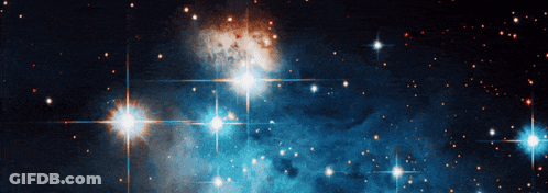 A Cluster Of Stars Surrounded By A Blue Background GIF