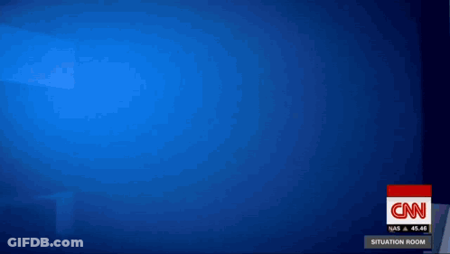 A Cnn Screen Shows A Red And Blue Background GIF