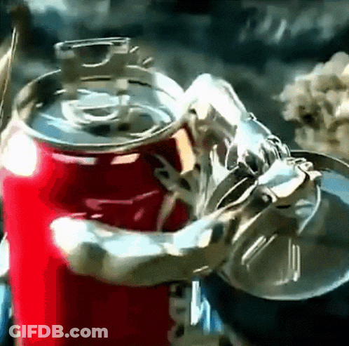 A Coca Cola Can Is Being Held By A Robotic Arm GIF