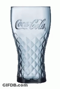 A Coca Cola Glass With A Diamond Pattern On It GIF