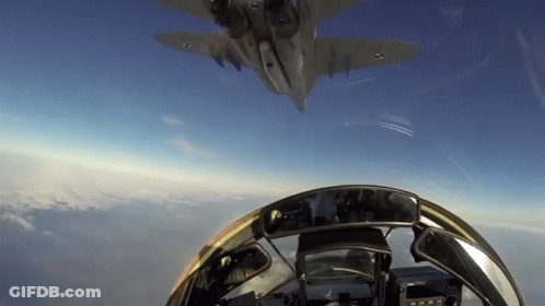 Cockpit View Of Fighter Jet In Blue Sky GIF