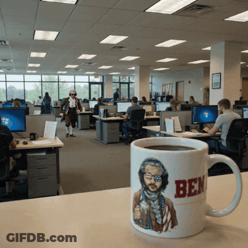 A Coffee Mug That Says Ben On It GIF
