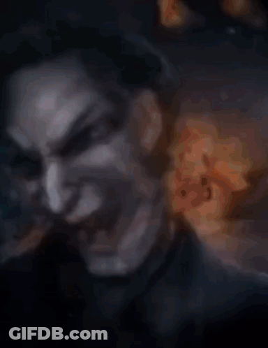 A Collage Of Images Of A Woman 'S Face With A Fire Background GIF