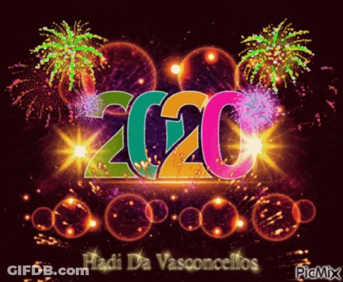 A Colorful Fireworks Display With The Year 2020 GIF