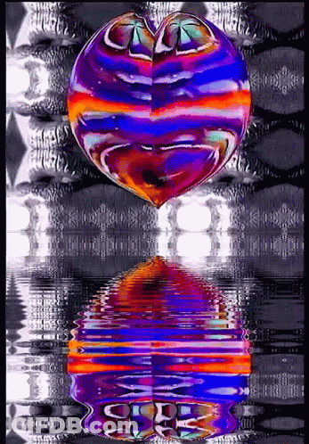 A Colorful Heart Is Reflected In The Water . GIF