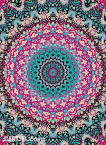 A Colorful Kaleidoscope With A Circular Pattern In The Center . GIF