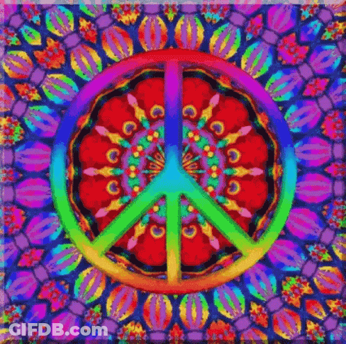 A Colorful Peace Sign Is Surrounded By A Kaleidoscope Of Flowers . GIF