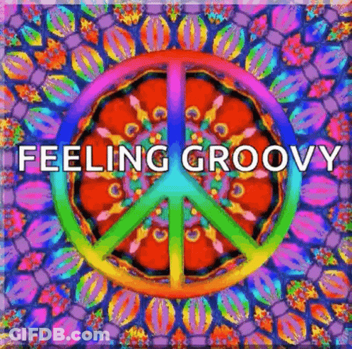 A Colorful Peace Sign With The Words `` Feeling Groovy '' Written Inside Of It GIF