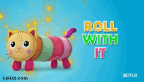 A Colorful Stuffed Cat With The Words Roll With It Written On The Bottom GIF