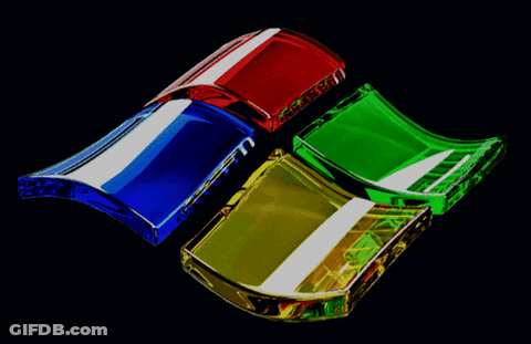A Colorful Windows Logo Is Displayed On A Dark Background GIF