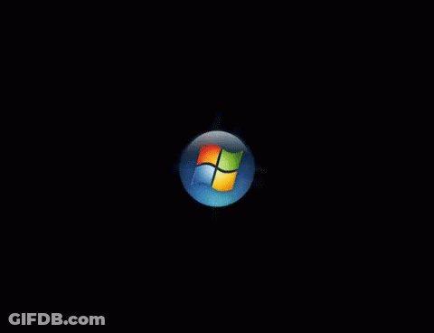A Colorful Windows Logo On A Dark Background GIF