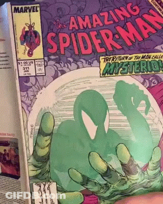 A Comic Book Called The Amazing Spider Man GIF