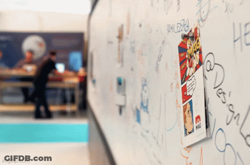 A Comic Book Is Hanging On A White Board With Graffiti On It Including One That Says ' Imgflip.com ' GIF