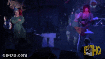 A Comic Con Hq Logo Is Displayed On A Dark Background GIF