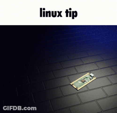 A Computer Chip Is Laying On A Brick Floor With The Words Linux Tip Below It GIF