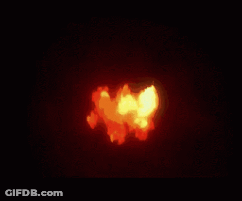 A Computer Generated Image Of A Fire Explosion On A Black Background GIF