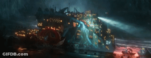 A Computer Generated Image Of A Futuristic City With A Lot Of Lights On It GIF