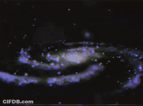 A Computer Generated Image Of A Galaxy With A Star In The Middle GIF
