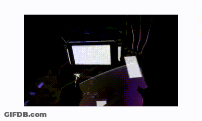 A Computer Generated Image Of A Purple Glowing Object In The Dark GIF